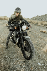 Fototapeta premium Man smoking with motorcycles on the off road