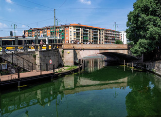 Obraz premium Milan - Italy, bridge over the Naviglio Grande at the entrance to the Darsena (harbour)