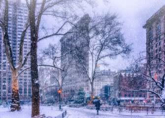 Snow Falling in Madison Square Park. Flatiron Building.