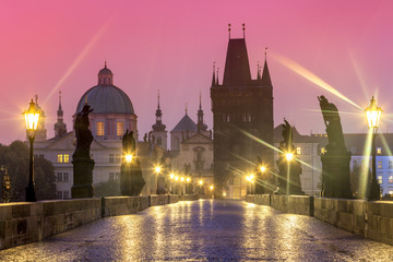 Fototapeta na wymiar Charles bridge in Prague at rainy night, nobody