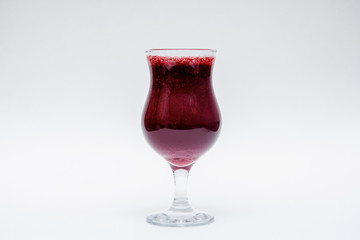 Tasty blueberry smoothie in glass on white background