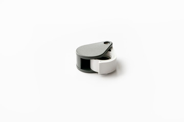 Magnifying glass for diamonds or see the amulet Isolated on a White Background.
