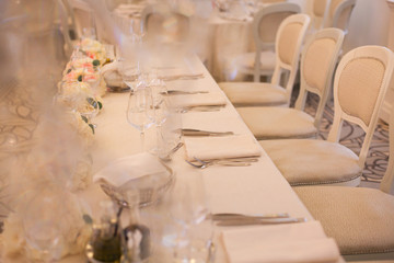 Elegant wedding reception table arrangement, floral centerpiece