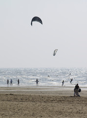 kite surfers and people at the beach of Katwijk