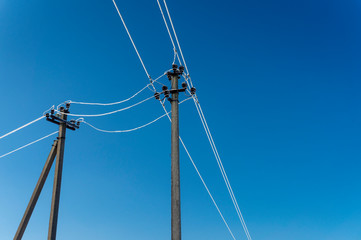 Electric line poles with frozen wires