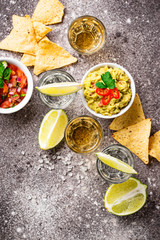 Shots of silver and gold tequila