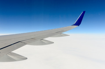 Airplane wing over Greenland's glaciers 4