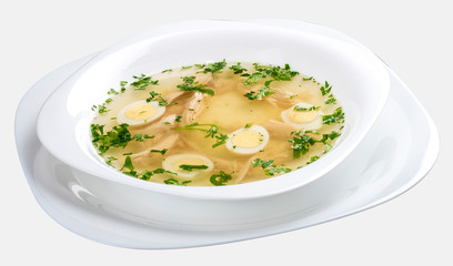 Chicken broth with quail eggs and crackers.