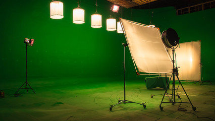 Modern TV Studio Green Screen chroma key background with camera and Light Equipment