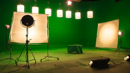 Modern TV Studio Green Screen chroma key background with camera and Light Equipment