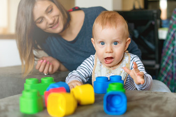 Mother playing with baby	