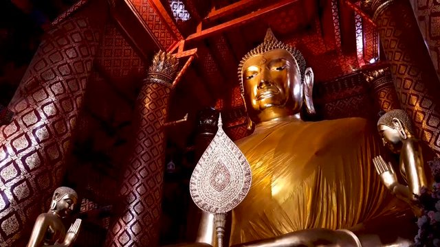 Main buddha Statue at Wat Phanan Choeng temple,Phra Nakhon Si Ayutthaya, Thailand, World Heritage Site famous place for torism , Public place, 4K 30 FPS