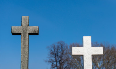Graves with crosses at cemetery