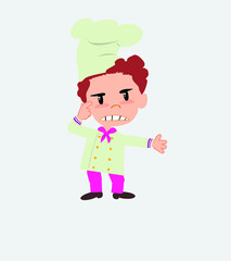 Chef, is angry and points his head with his index finger.