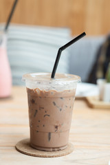 Iced mocha coffee with black straw
