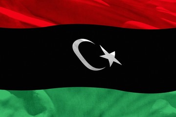 Waving Libya flag for using as texture or background, the flag is fluttering on the wind
