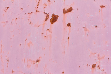 rusty metal pink wall with fallen off paint, rusty background
