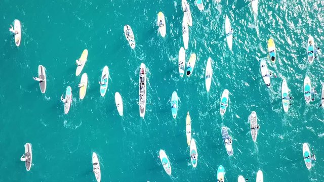 Aerial bird's eye view video taken by drone of paddle surfing in Corinth Canal of Isthmos or Isthmus, Peloponnese, Greece