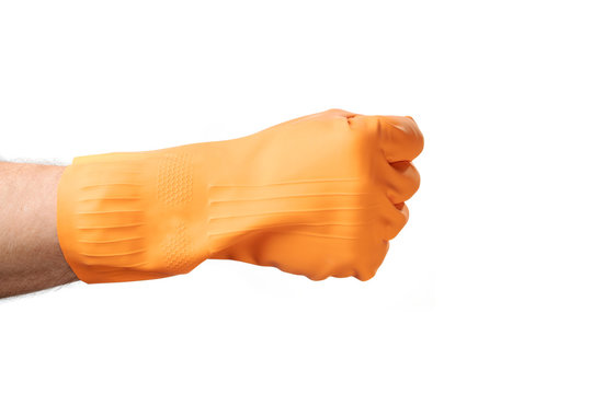 Hand In Orange Rubber Glove Shows A Sign Or Symbol Fist Punch.