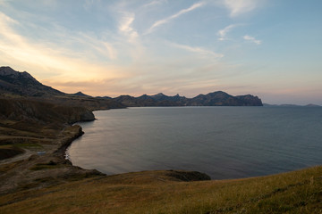 Crimean bay at sunset. Cape Meganom