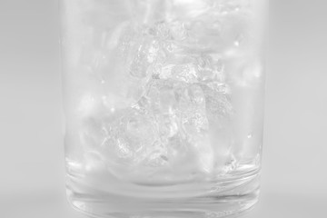 Close up ice cubes in glass.