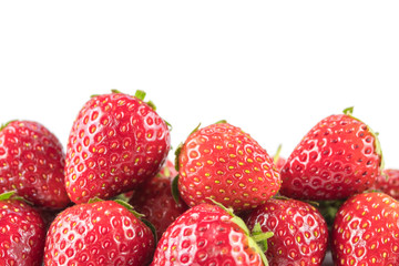 Strawberry on white background with copyspace.
