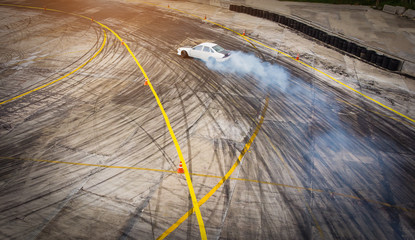 Top view Aerial view photo driver drifting car on asphalt track,Car drift  © jamesboy