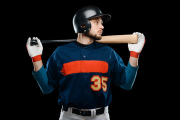 Baseball player on black background