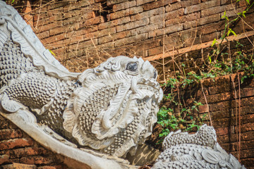 Beautiful statue of mom, the mythical guardian animal at Wat Phra That Doi Suthep, the famous temple and became the landmark of Chiang Mai, Thailand.