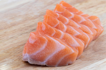 Fillet of salmon isolated on wood