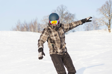 Fototapeta na wymiar Men on the snowboard. Winter time