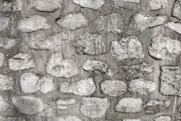 Granite texture old stone. Close-up wall, retro