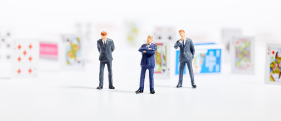 Miniature people : business man on Playing cards.