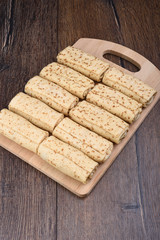 Pancake rolls on a wooden cutting board