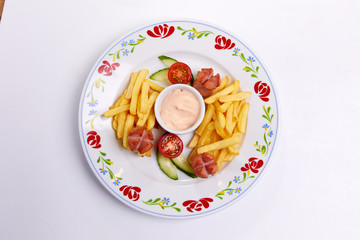 french fries with sausage and sauce