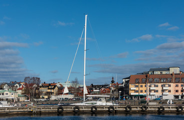 Houses, boats and sea at spring in Vaxholm and Stockholm archipelago