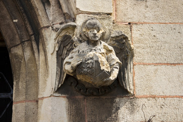 Angel on church wall.