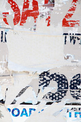 Fototapeta premium Torn posters on billboard.