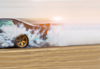 Blurred Race car drifting on speed track on twilight background. © jamesboy