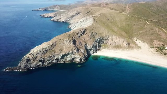 Aerial dorne bird's eye view video of iconic beach of Potami or River with turquoise clear waters, South Evia island, Greece