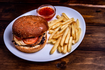 Big Tasty Burger And Fries With sauce.
