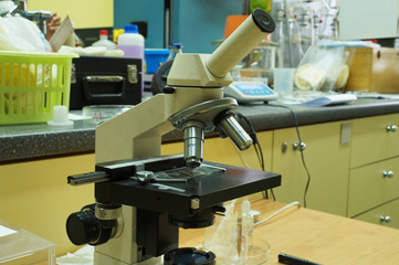 Technical University. View of a chemical laboratory with a microscope in the foreground.
