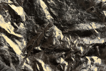 Old crumpled reflective background, grunge style.