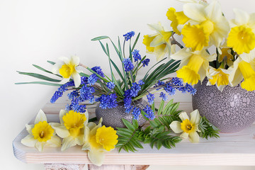 Bouquet of spring flowers of daffodils and hyacinths on white background