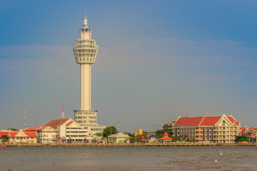Riverfront view of Samut Prakan city hall with new observation tower and boat pier. Samut Prakan is at the mouth of the Chao Phraya River on Gulf of Thailand.