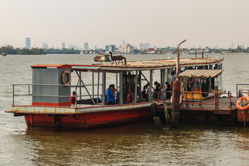 Fototapeta na wymiar Samut Prakan, Thailand - March 25, 2017: Local ferry pier across Chao Phraya River at Amphur Muang district, Samut Prakarn, Thailand.