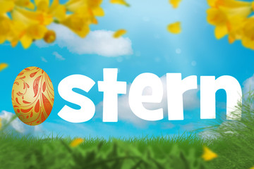 Osterhase auf einer grünen Wiese.
