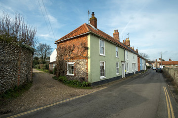 Fototapeta na wymiar Village houses in the village of Blakeney, Norfolk, uK