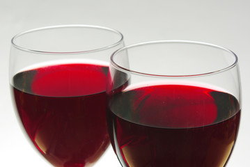 Two glasses of red wine. Close-up