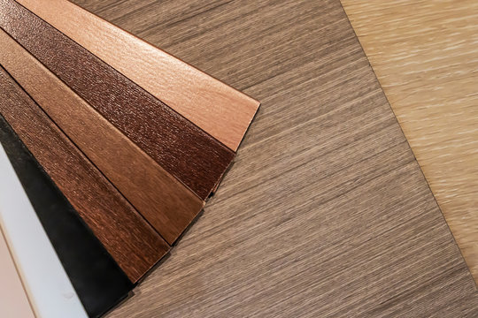 PVC Polymer Vinyl sample for customers to choose the floor design within the copy space .
